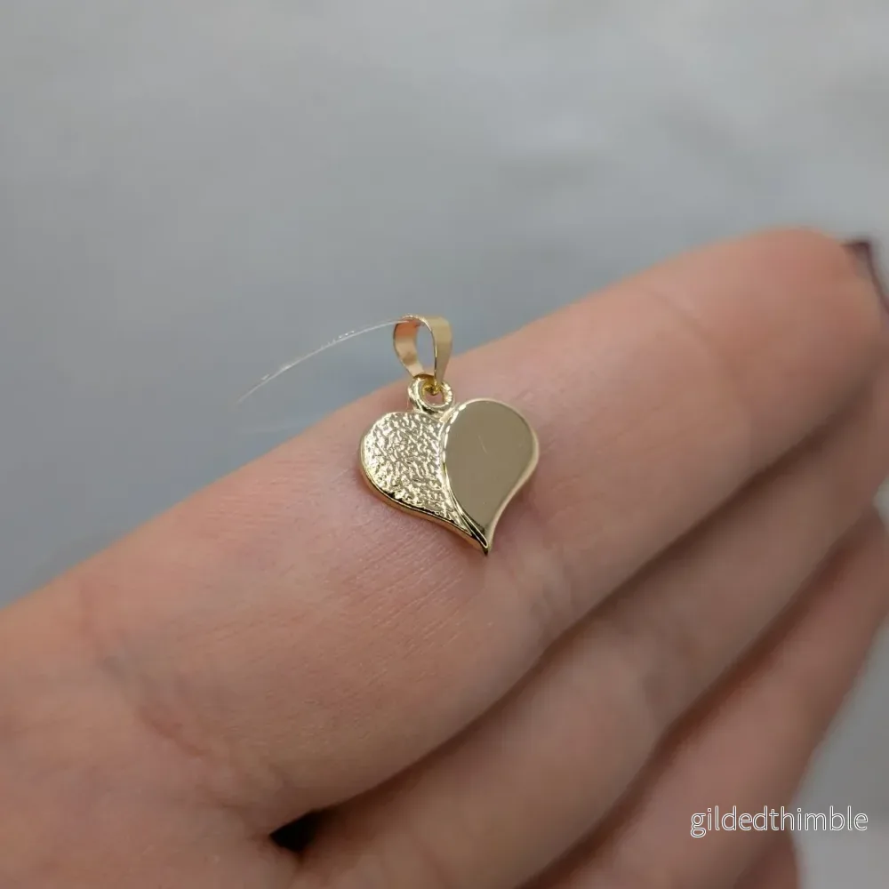 Guldhänge hjärta räfflat 18k guld Guldhänge hjärta räfflat 18k guld