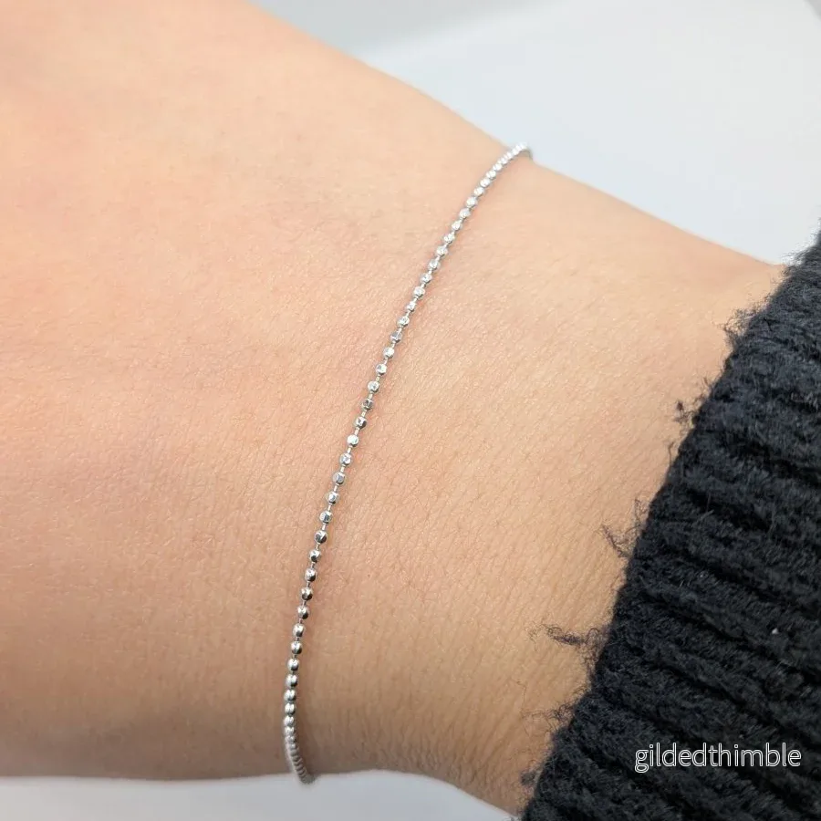 Facetterad kullänk armband i 18k vitguld