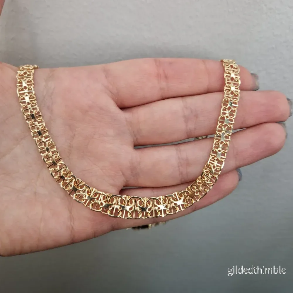 Doserad x-länk 18k guld
