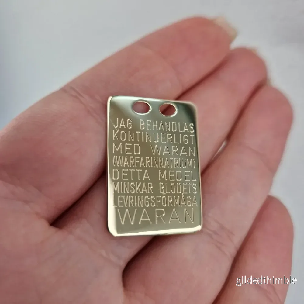 Waran bricka i 18k guld Waran bricka i 18k guld