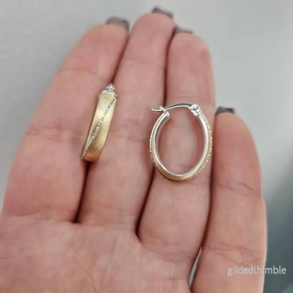 Ovala creoler tvåfärgat 18k guld Ovala creoler tvåfärgat 18k guld