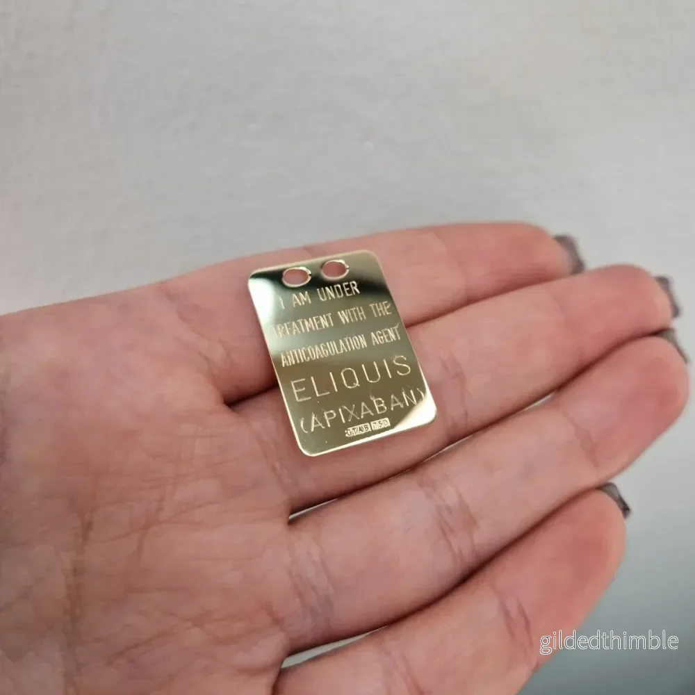 Eliquisbricka i 18k guld Eliquisbricka i 18k guld
