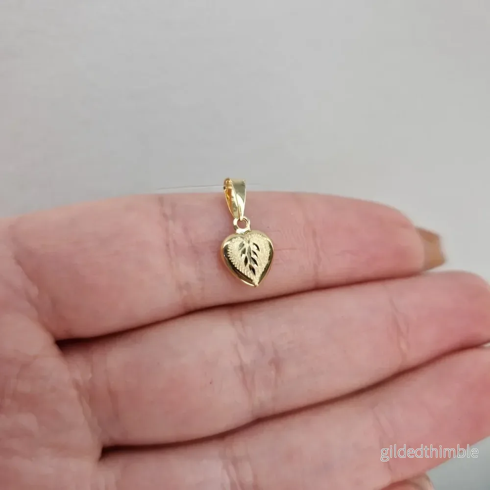 Graverat litet hjärta 18k guld