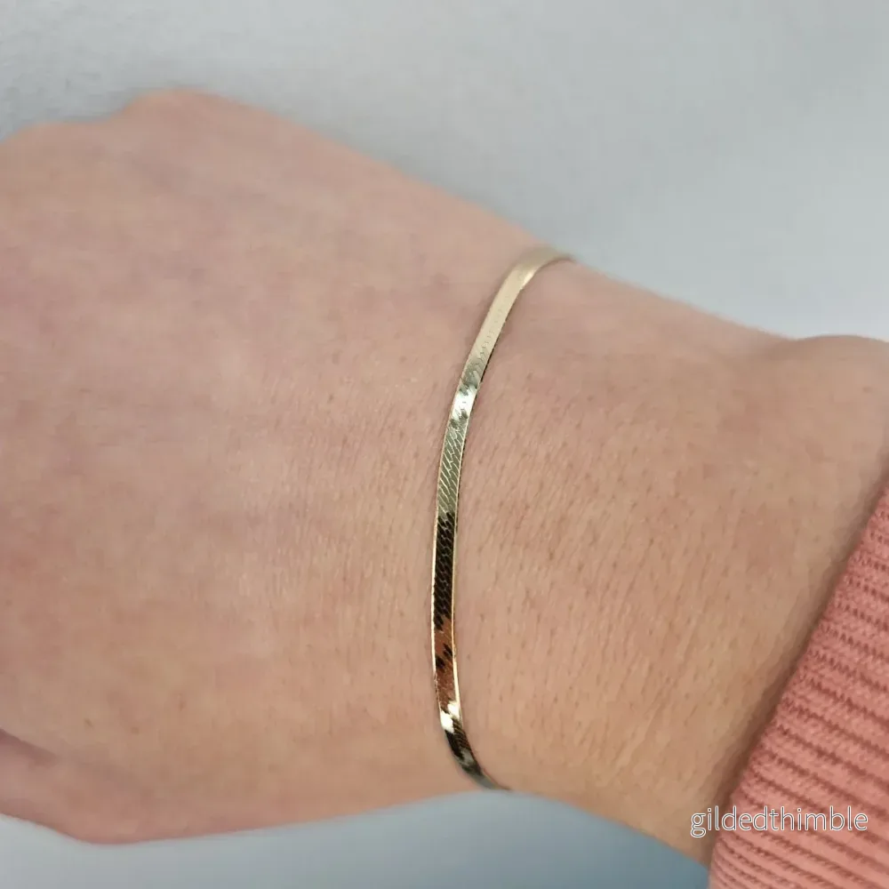 Armband manglad 18k guld Armband manglad 18k guld