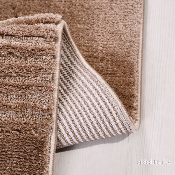 Izaka Sienna – Elegant struktur i varma toner - Bild 2