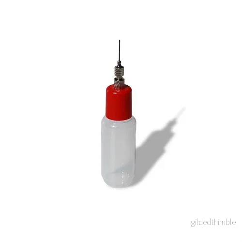 Plastflaska med färgat lock - Bild 3