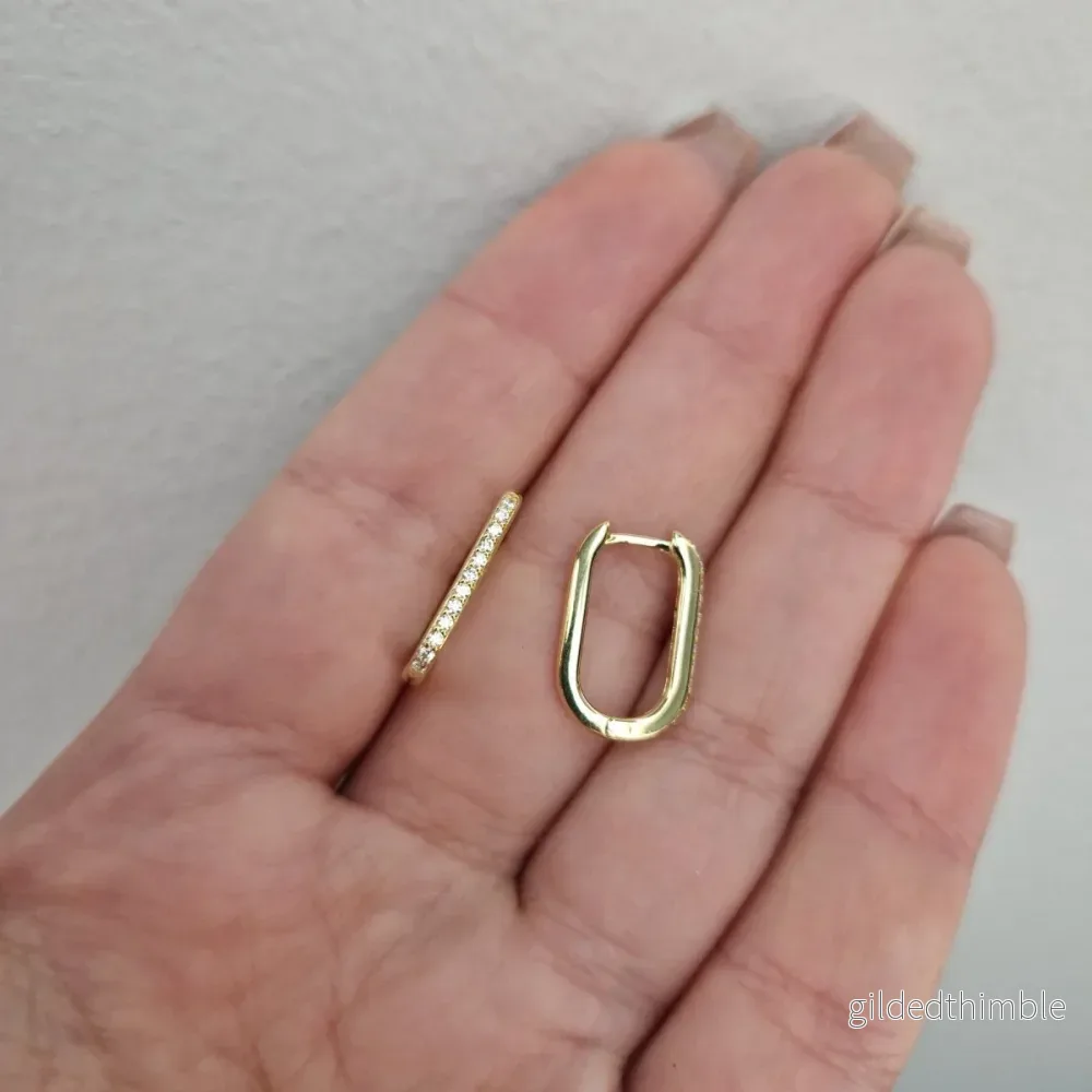 Ovala 18k guld creoler med stenar Ovala 18k guld creoler med stenar