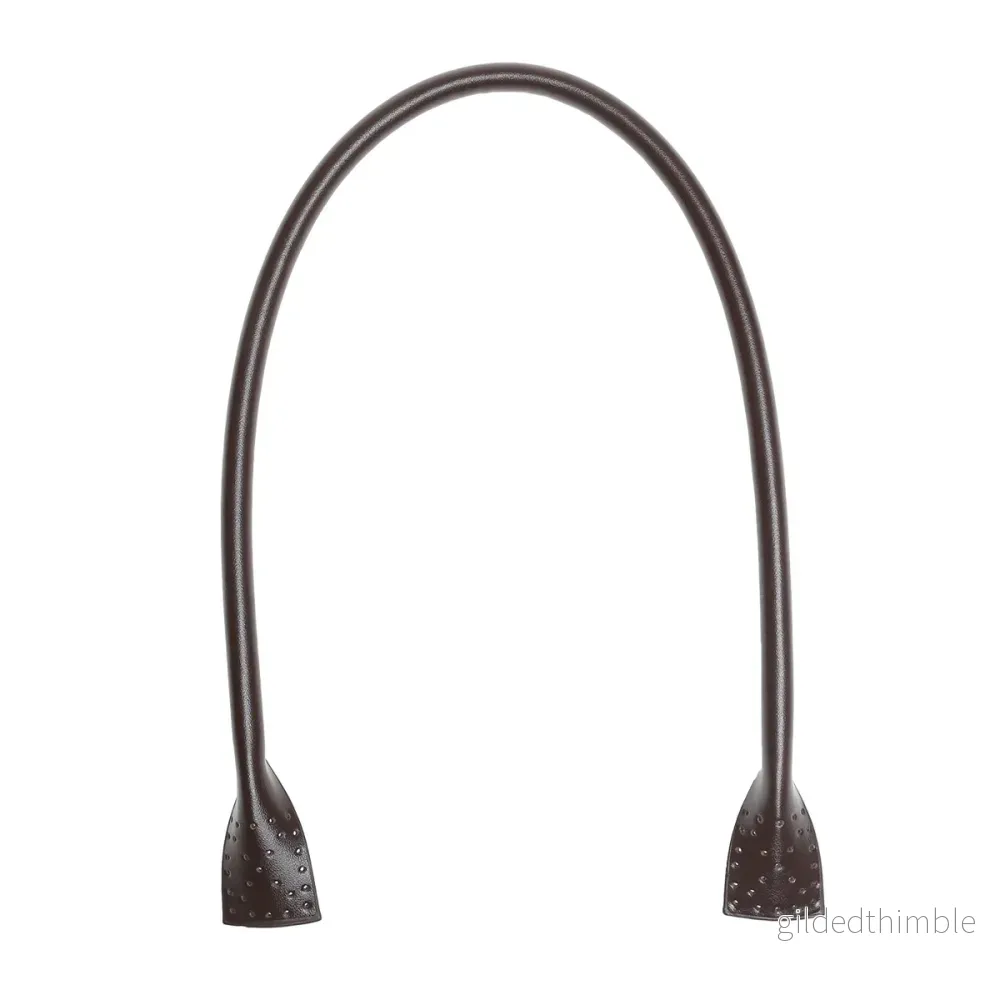 Väskhandtag i konstläder 2-pack att sy på, 66 cm. mörkbrun Väskhandtag i konstläder 2-pack att sy på, 66 cm. mörkbrun