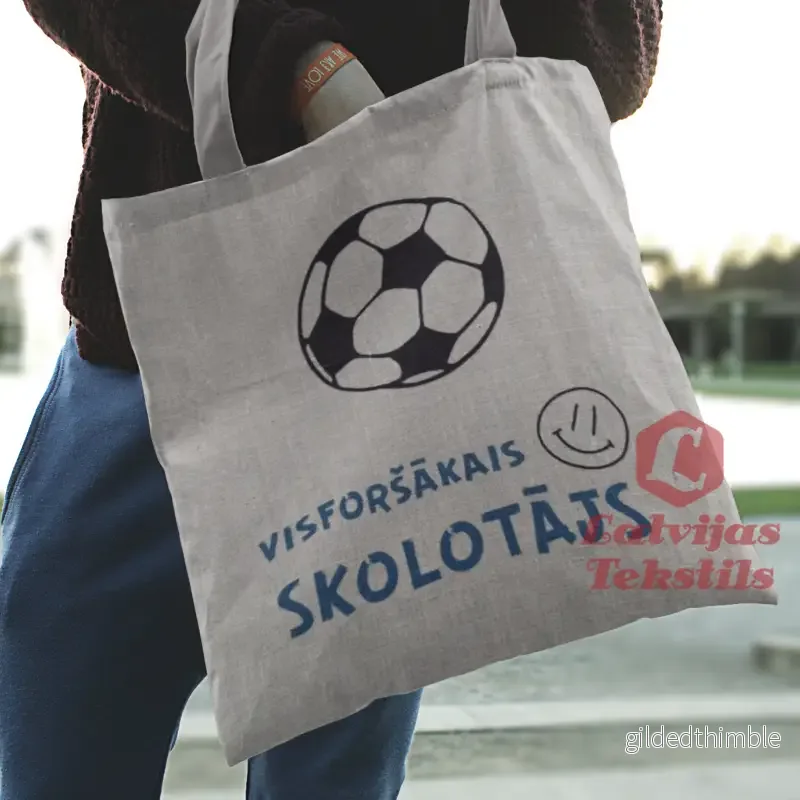 Pelēka lina auduma maisiņš «Visforšākais skolotājs – Sports» | kolekcija «Māci.Mīli.Iedvesmo.»