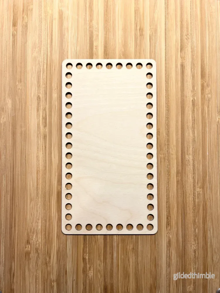 Träbotten rektangel 22×12 cm.