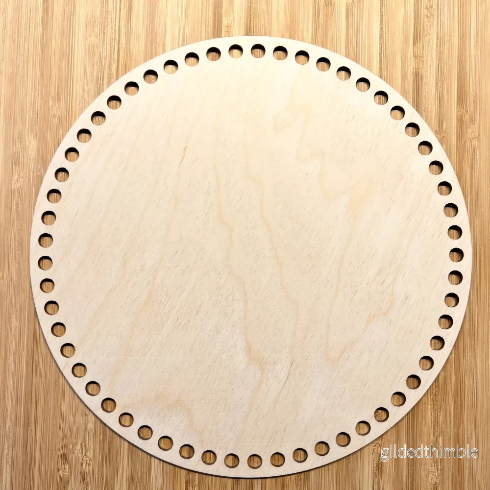 Träbotten rund 25 cm. Träbotten rund 25 cm.