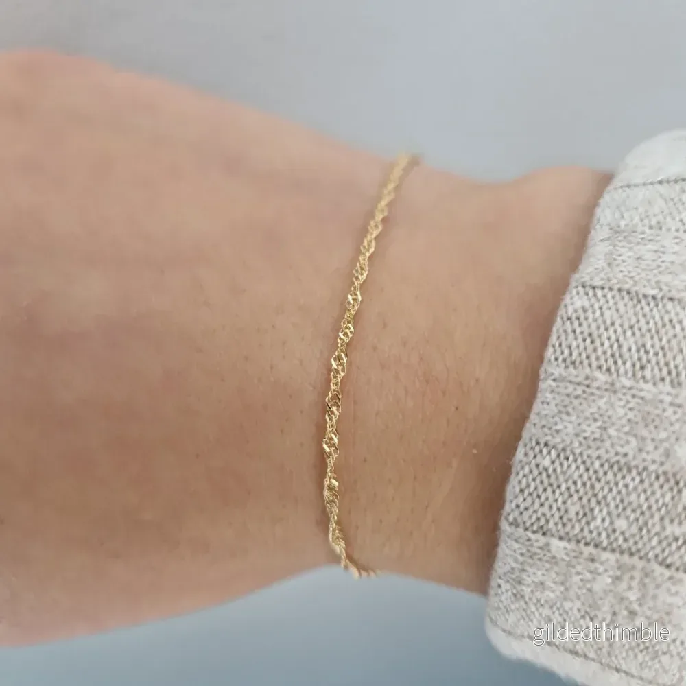 18k Guld armband Singapore 1,5mm 18cm 18k Guld armband Singapore 1,5mm 18cm