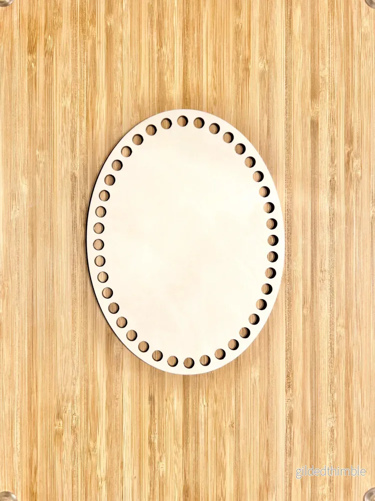 Träbotten oval 20x15 cm.