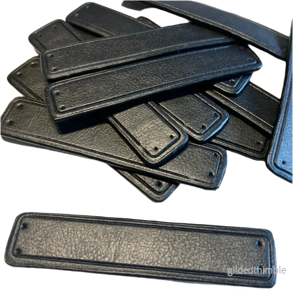 Rem att sy på – konstläder – 1 st. – 10 x 2 cm. – Svart Rem att sy på – konstläder – 1 st. – 10 x 2 cm. – Svart