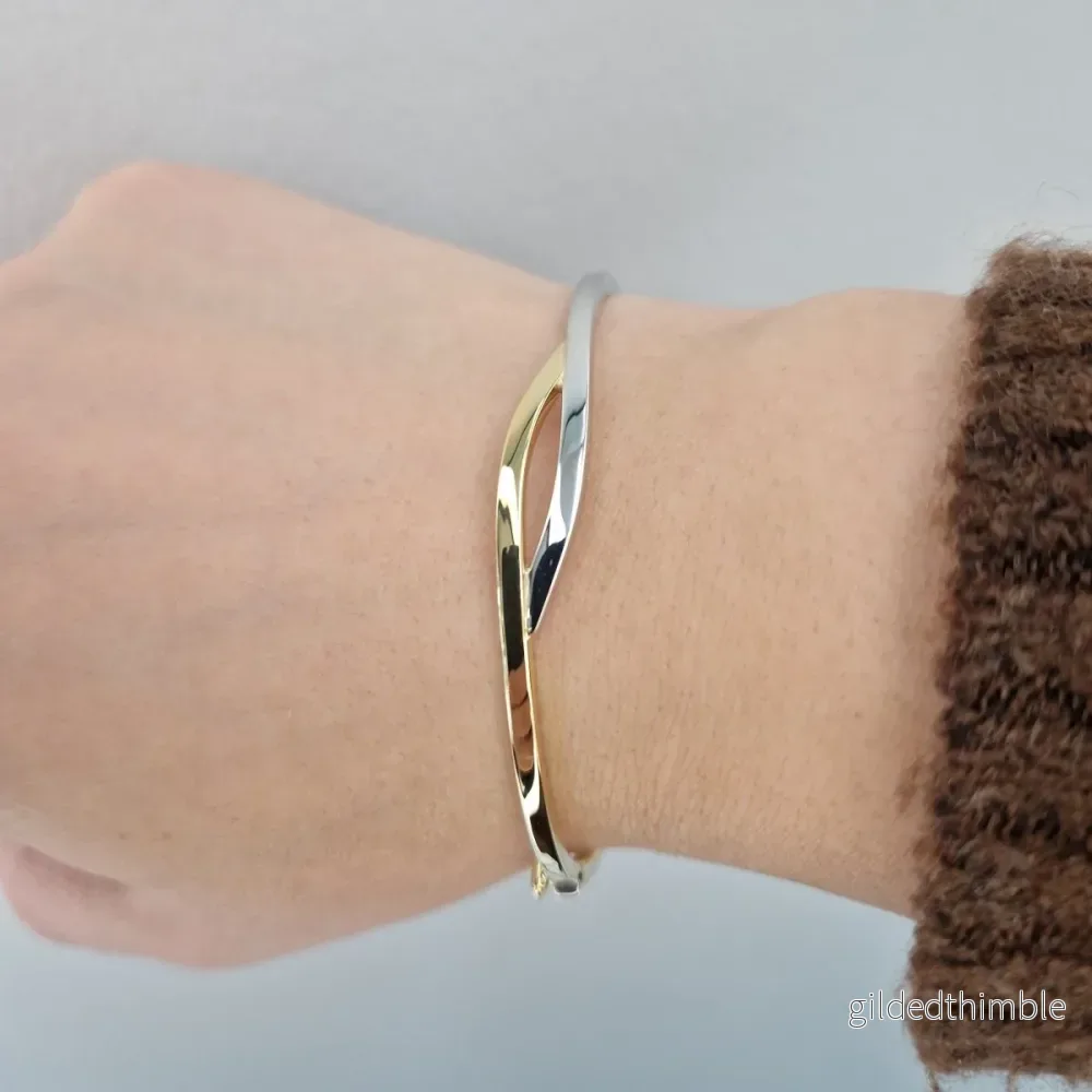 Armring i tvåfärgat 18k guld