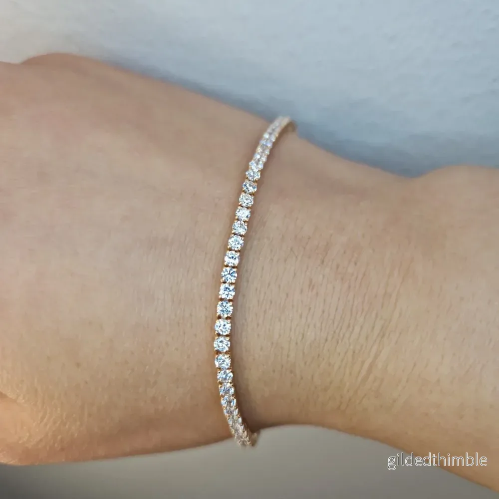 Tennis armband 18k guld bredd 2,5mm Tennis armband 18k guld bredd 2,5mm
