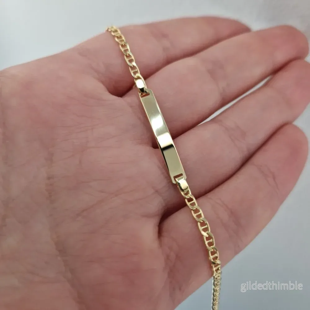 Barn armband med gravyr platta 18k guld Barn armband med gravyr platta 18k guld