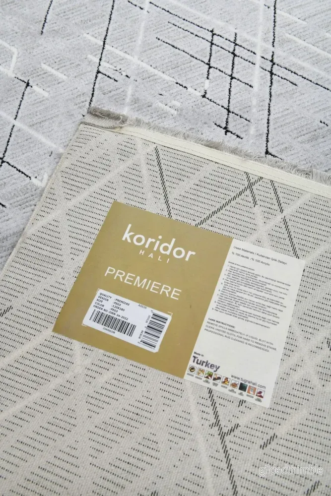 Premiere Nova - Grafisk elegans i grå toner – en modern matta som lyfter varje rum. - Bild 2