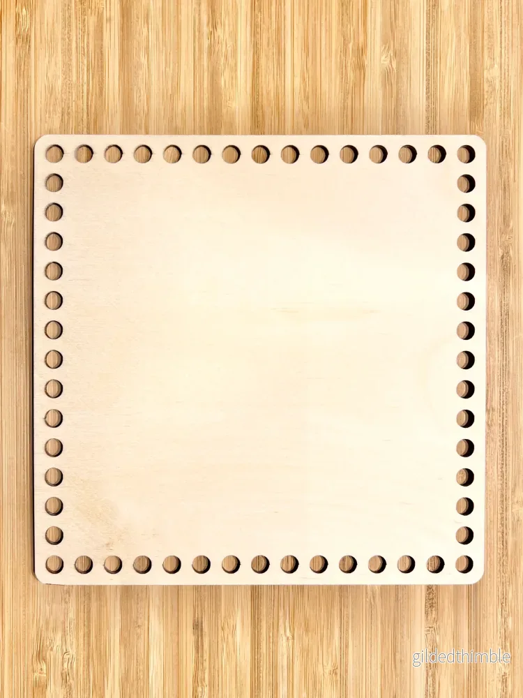 Träbotten kvadrat 25×25 cm.