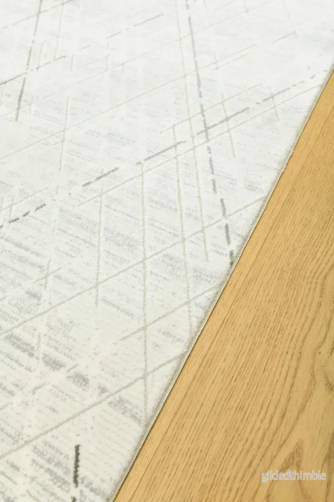 Premiere Grid – Modern Matta med Asymmetrisk Rutdesign i Elfenbensvitt och Grått - Bild 2