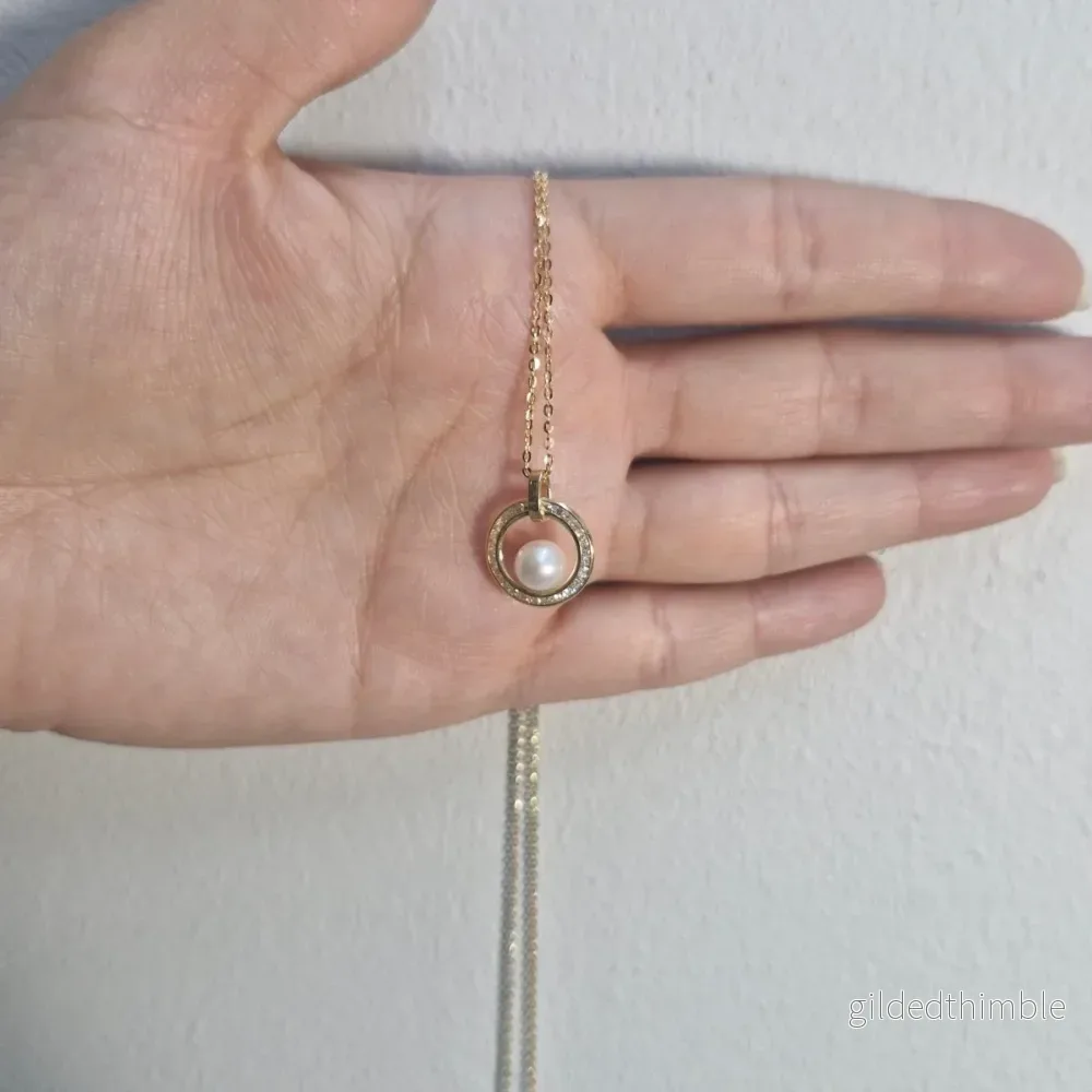 Halsband 18k guld med sötvattenpärla och zirconer - Bild 2