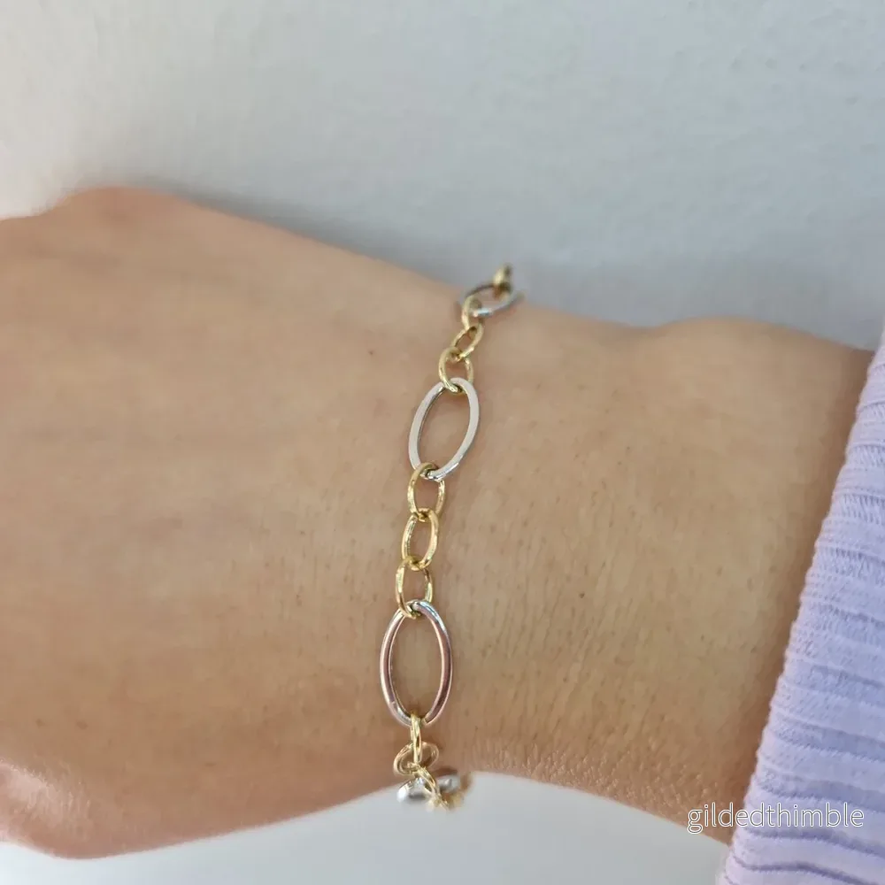 Armband två-färgat 18k guld Armband två-färgat 18k guld