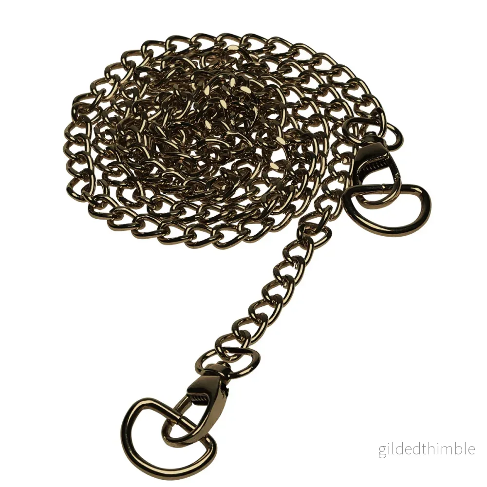 Axelrem, metallkedja brons 120 cm. med karbinhakar och D-ringar Axelrem, metallkedja brons 120 cm. med karbinhakar och D-ringar