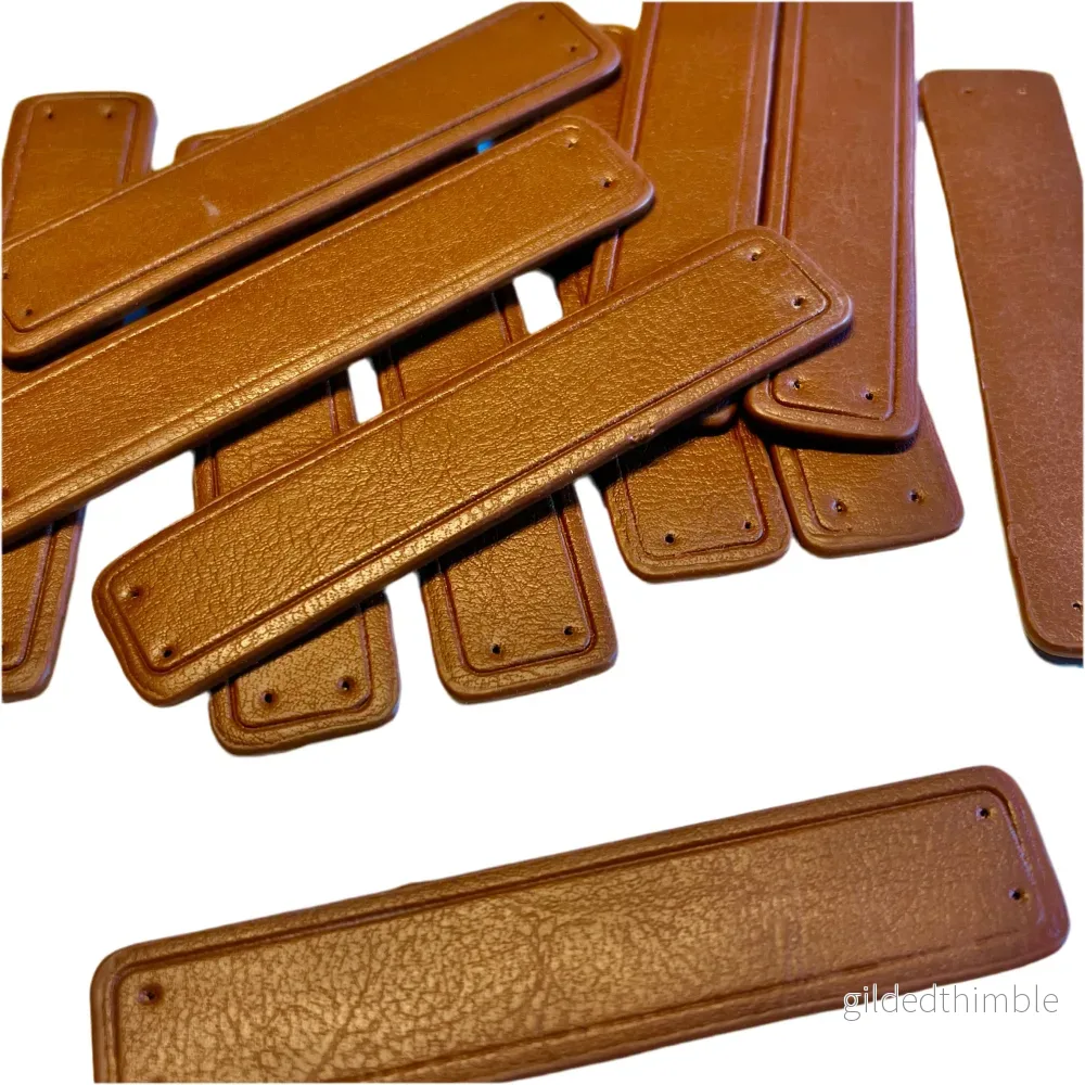 Rem att sy på – konstläder – 1 st. – 10 x 2 cm. – Brun Rem att sy på – konstläder – 1 st. – 10 x 2 cm. – Brun