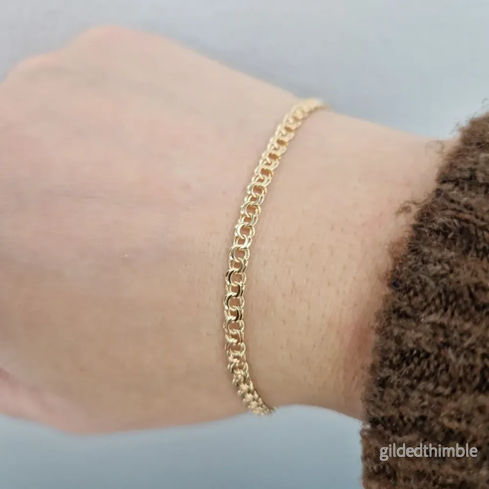 Bismarck armband i 18k guld