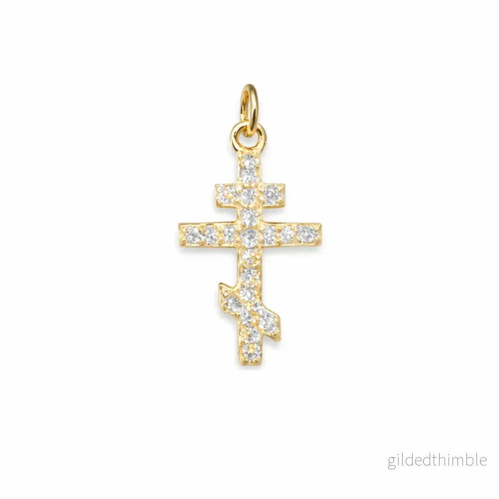 Ortodoxt kors 18k guld labb odlade diamanter